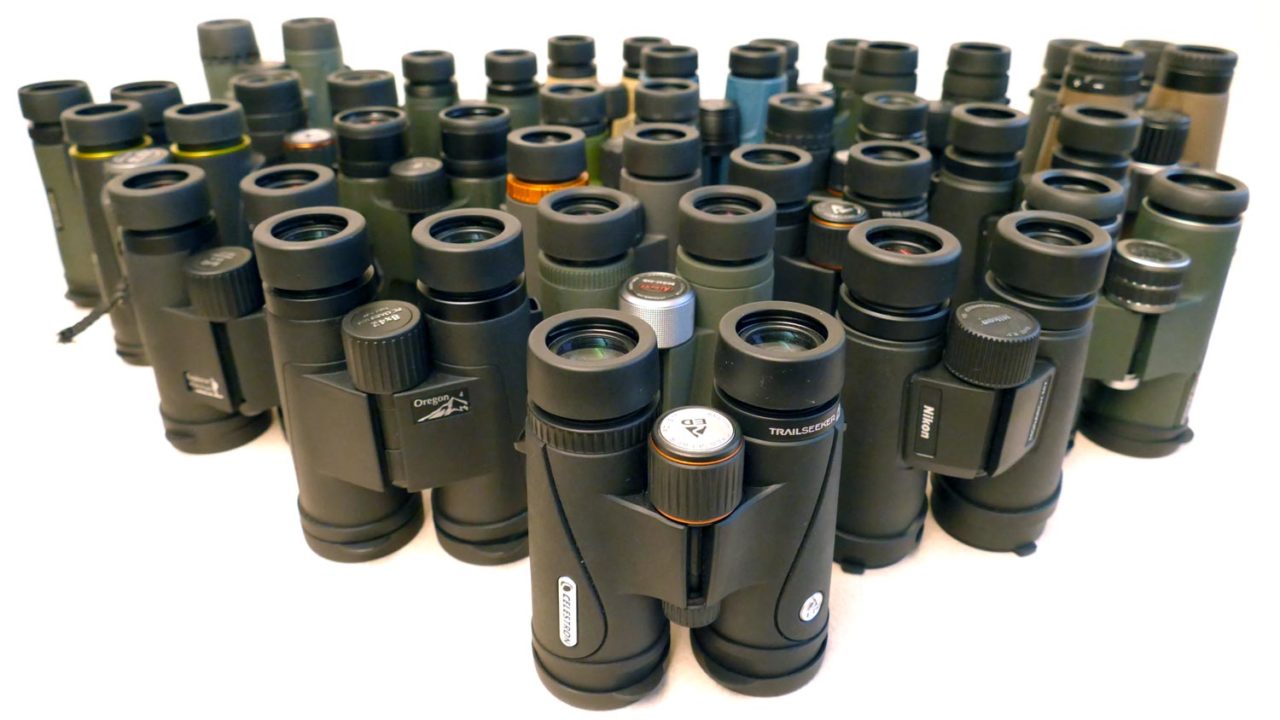 a group of binoculars arranged on a table